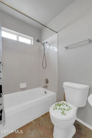 a bathroom with a sink a toilet and a bathtub