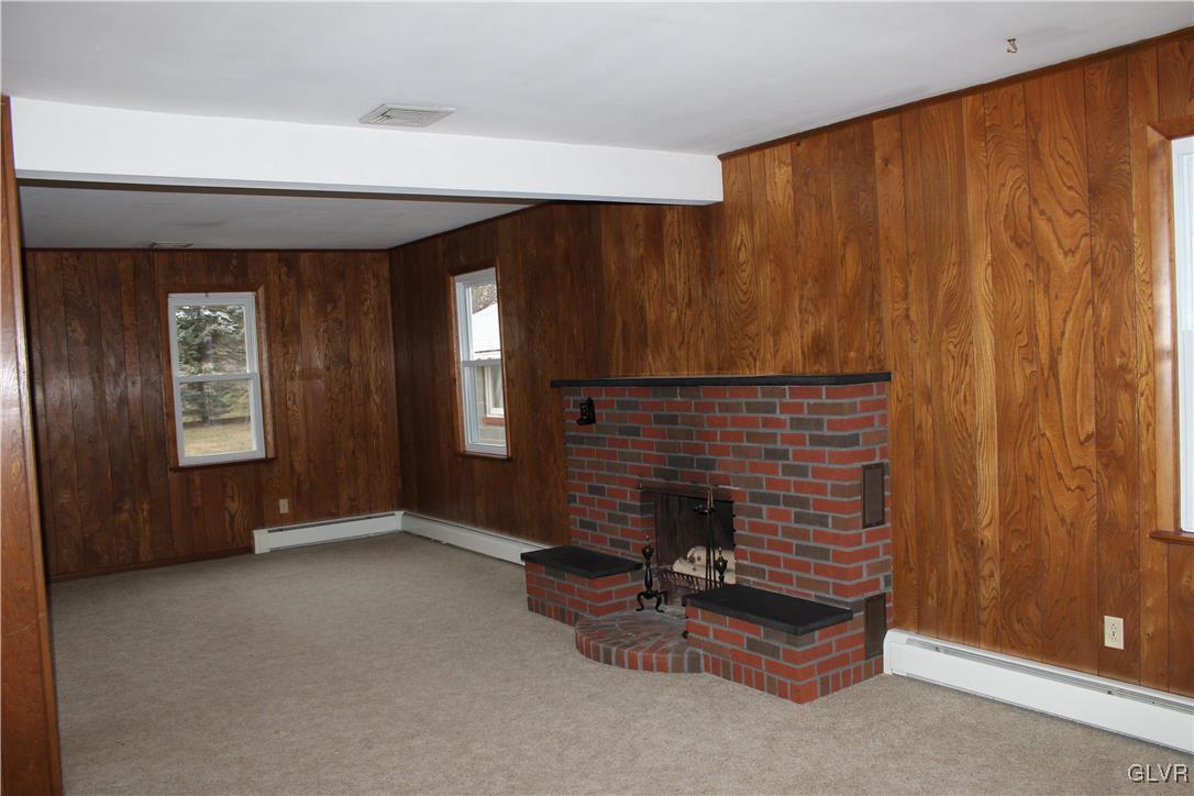 1227 Clearfield Road Nazareth, PA 18064 - Photo 9 of 18 a view of an empty room with a fireplace