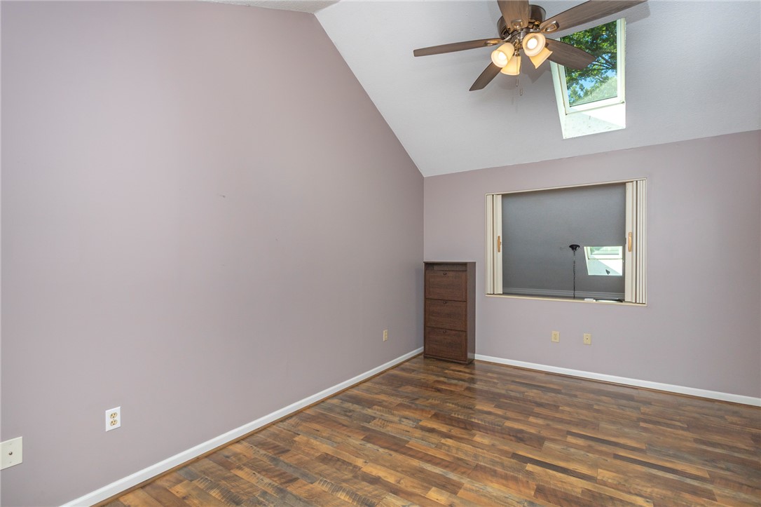 1302 Leeward Road Anderson, SC 29625 - Photo 20 of 50 A welcoming bedroom offers vaulted ceilings, hardwood flooring, and a window for natural light.