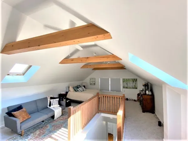 a view of entryway livingroom and hall
