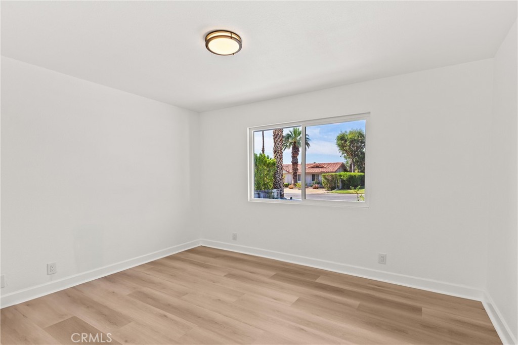 2852 East San Angelo Road Palm Springs, CA 92262 - Photo 14 of 25 an empty room with windows
