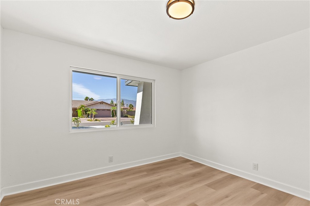 2852 East San Angelo Road Palm Springs, CA 92262 - Photo 22 of 25 an empty room with windows