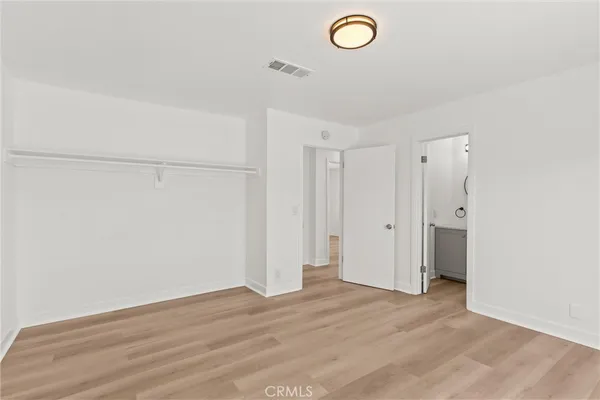 a view of a livingroom with wooden floor