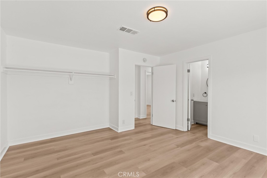 2852 East San Angelo Road Palm Springs, CA 92262 - Photo 5 of 25 a view of a livingroom with wooden floor