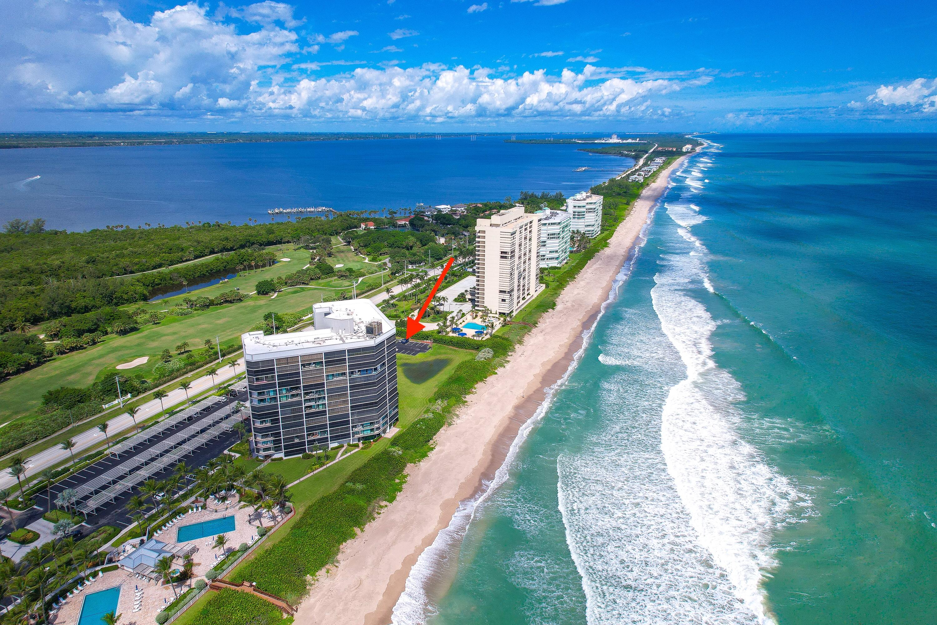 8800 South Ocean Drive, Unit 1102 Jensen Beach, FL 34957 - Photo 2 of 39 a view of a city with an ocean view