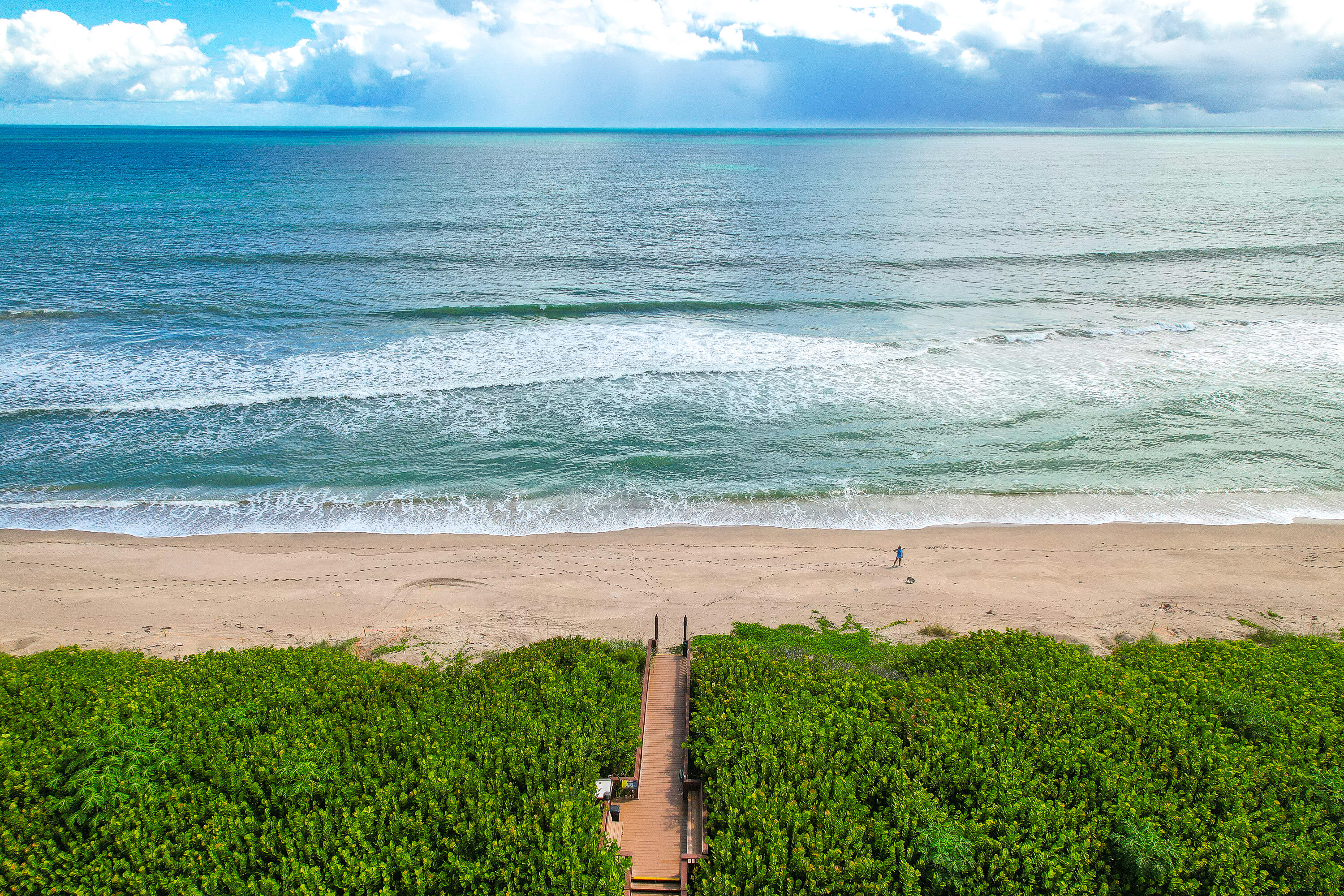 8800 South Ocean Drive, Unit 1102 Jensen Beach, FL 34957 - Photo 37 of 39 a view of an ocean beach