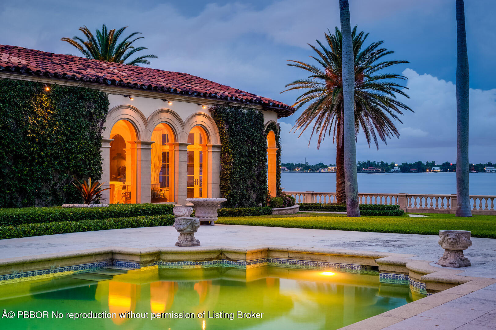 790 South County Road Palm Beach, FL 33480 - Photo 14 of 15 a front view of house with yard and swimming pool