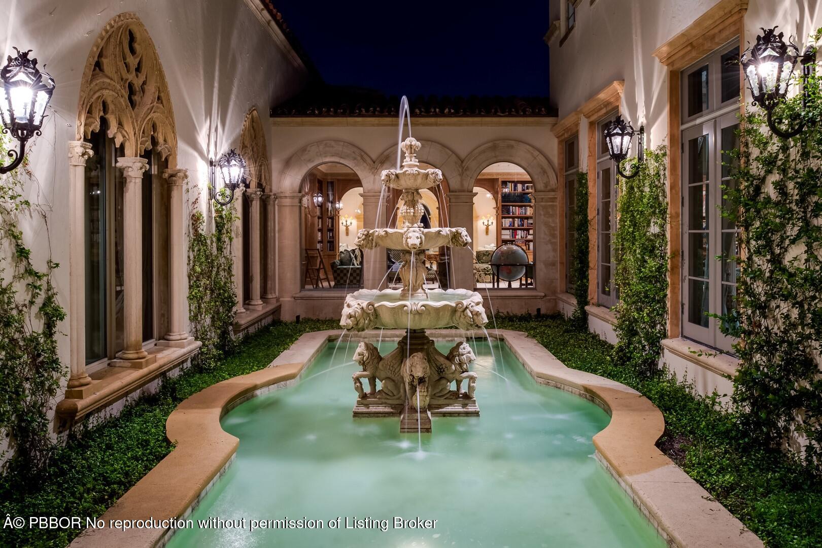 790 South County Road Palm Beach, FL 33480 - Photo 4 of 15 a front view of a house with a fountain