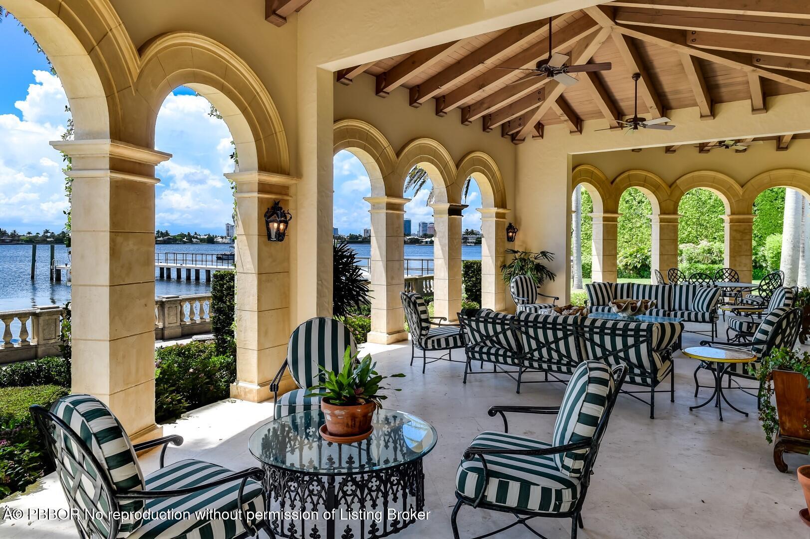 790 South County Road Palm Beach, FL 33480 - Photo 10 of 15 a front view of a house with outdoor seating