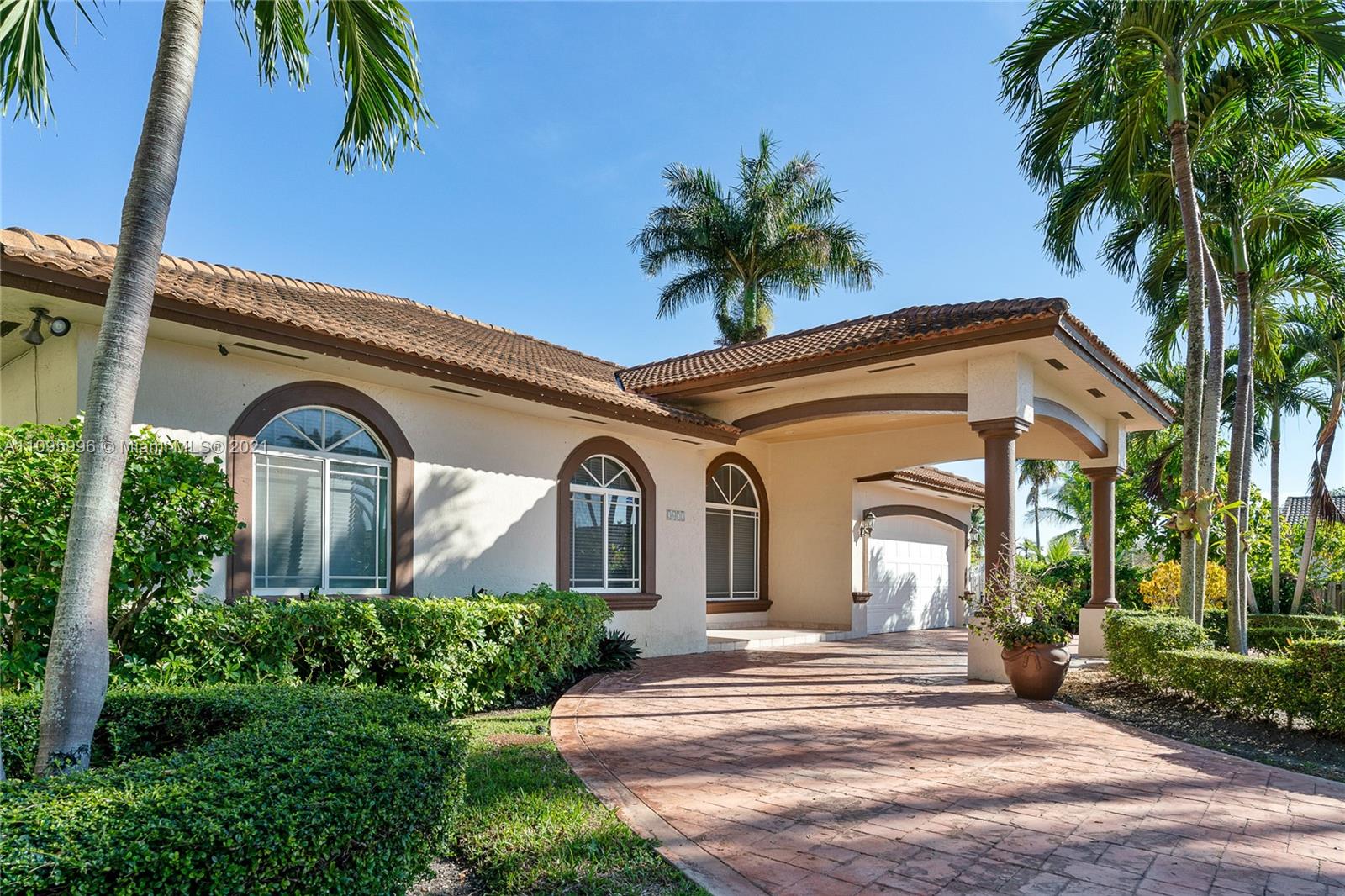 3671 Southwest 139th Court Miami, FL 33175 - Photo 11 of 56 a front view of a house with garden