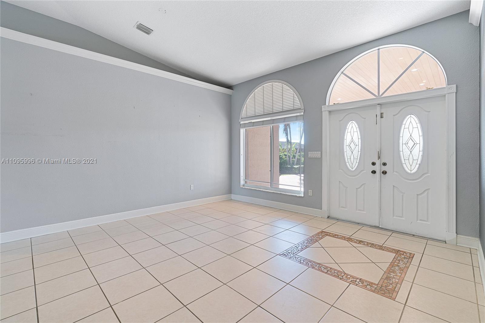 3671 Southwest 139th Court Miami, FL 33175 - Photo 13 of 56 an empty room with windows