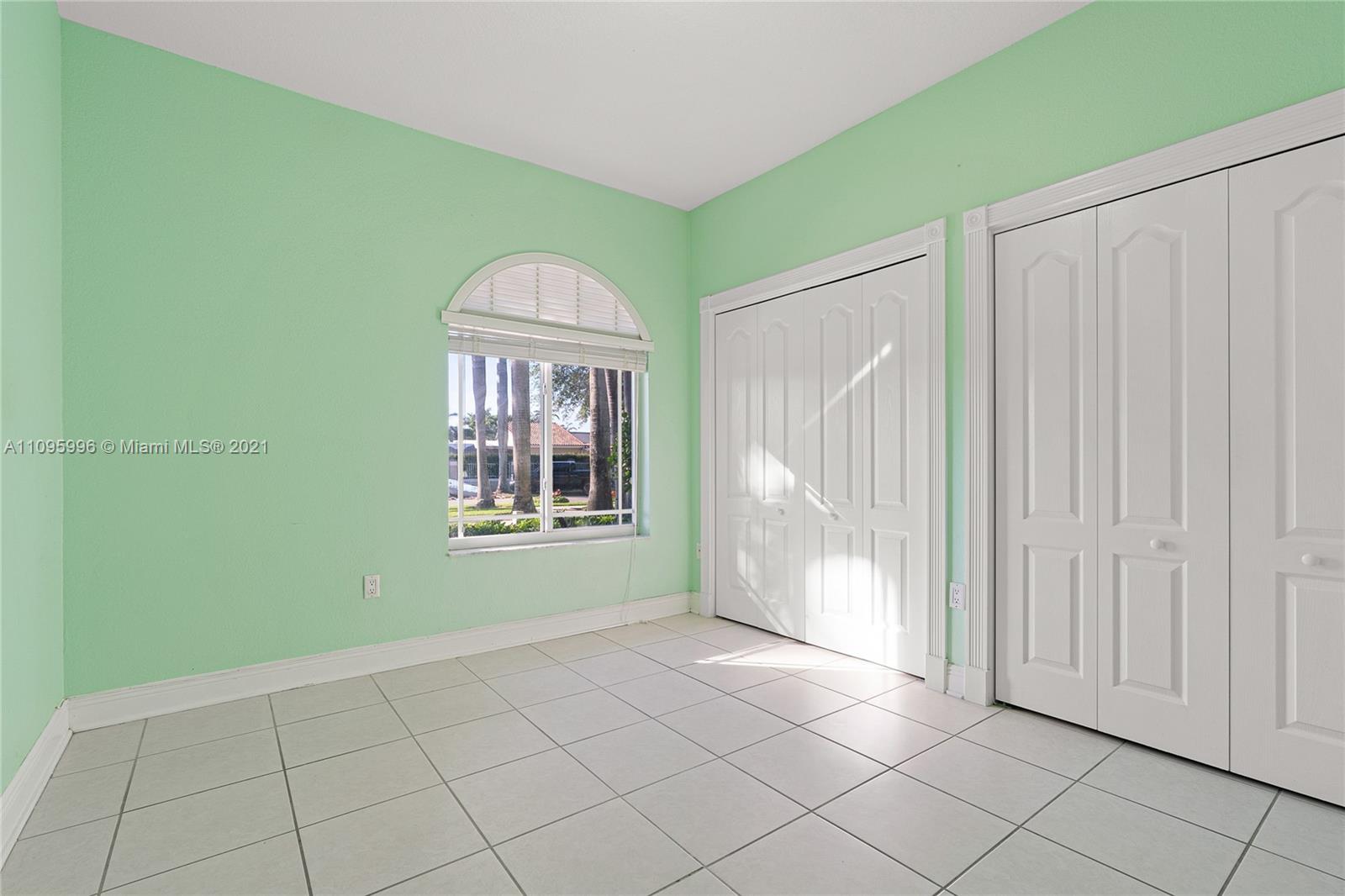 3671 Southwest 139th Court Miami, FL 33175 - Photo 17 of 56 a view of an empty room with a window