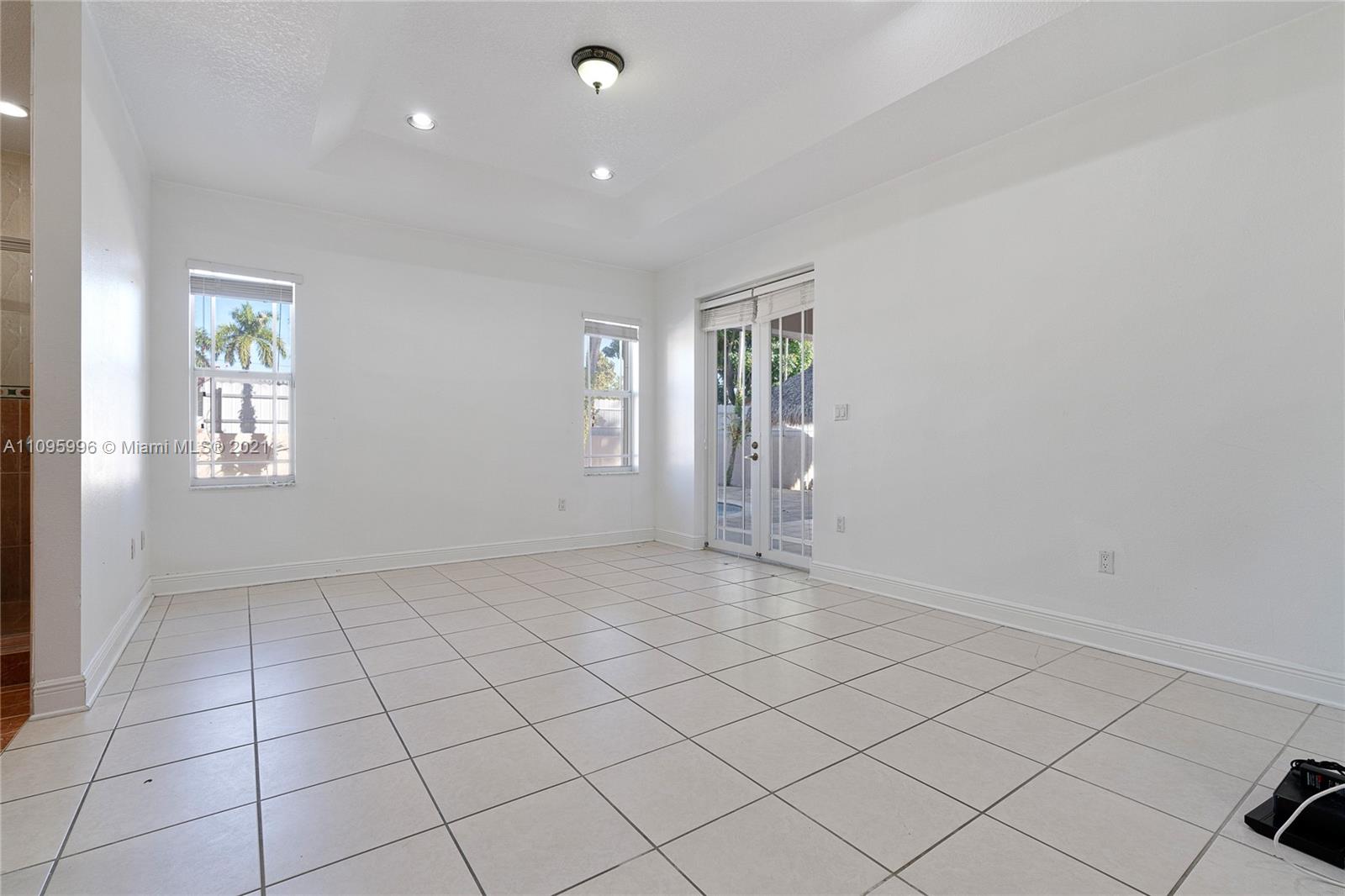 3671 Southwest 139th Court Miami, FL 33175 - Photo 23 of 56 an empty room with windows
