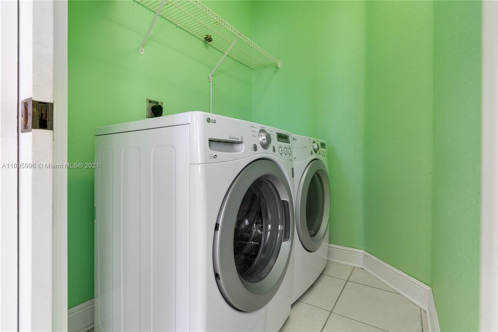 3671 Southwest 139th Court Miami, FL 33175 - Photo 36 of 56 a utility room with dryer and washer