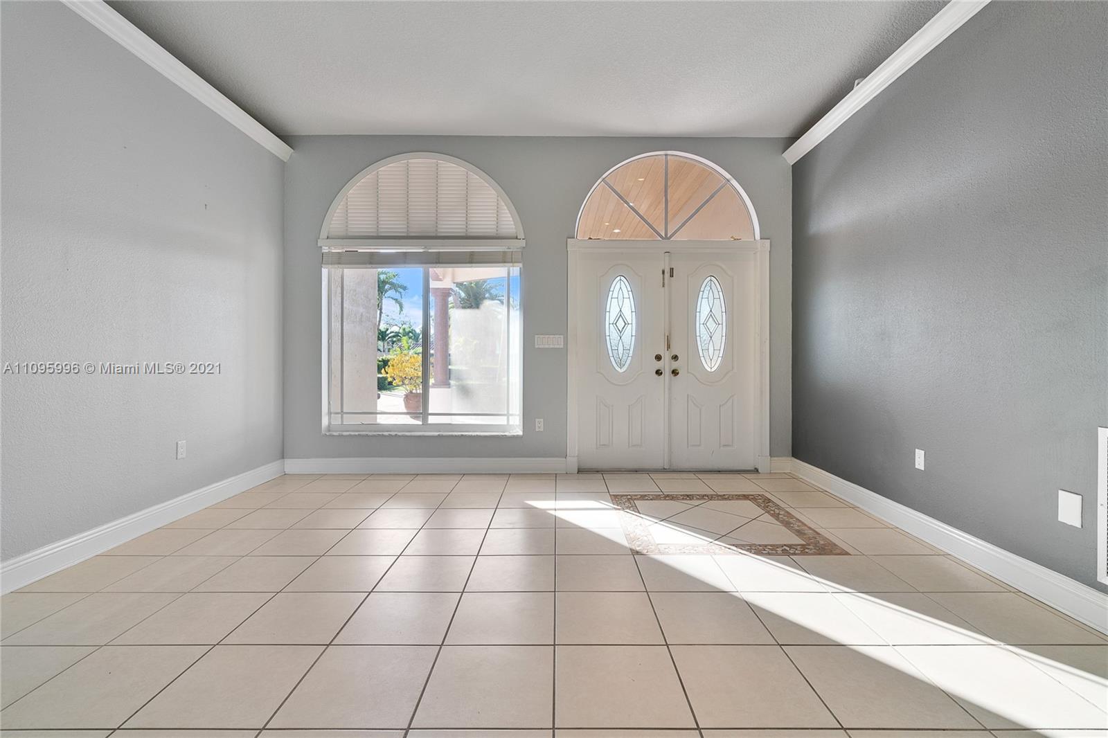3671 Southwest 139th Court Miami, FL 33175 - Photo 55 of 56 an empty room with windows