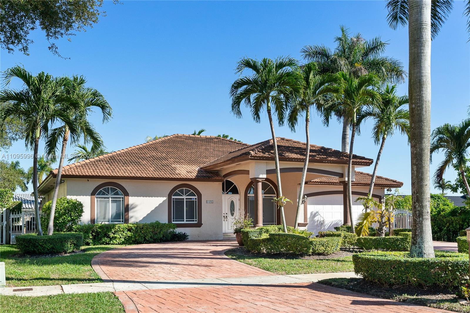 3671 Southwest 139th Court Miami, FL 33175 - Photo 8 of 56 a front view of a house with a yard