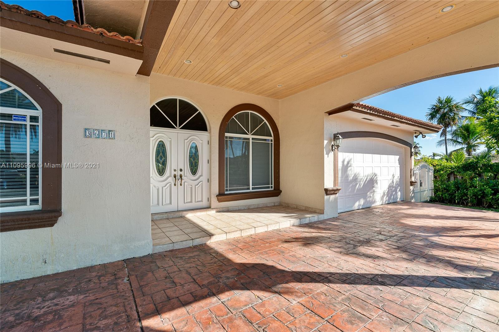 3671 Southwest 139th Court Miami, FL 33175 - Photo 10 of 56 a front view of a house with garden