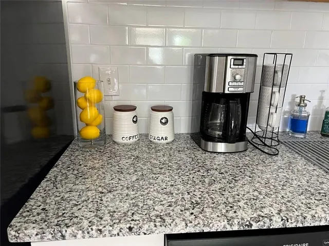 a living room with rug
