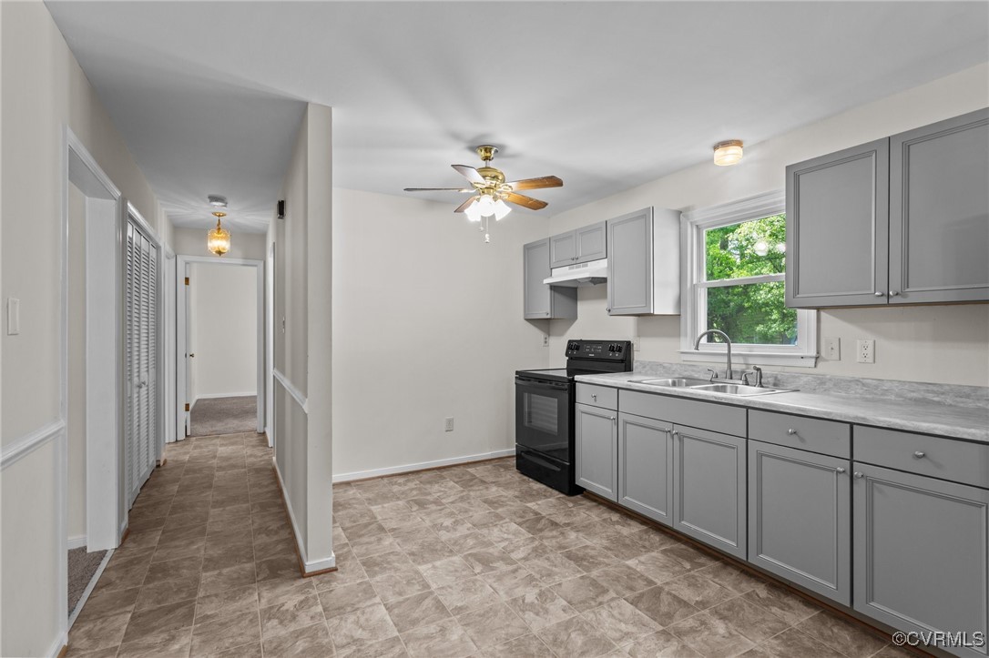 4232 Laurel Oak Road North Chesterfield, VA 23237 - Photo 9 of 45 Kitchen featuring a sink, gray cabinets, light cou