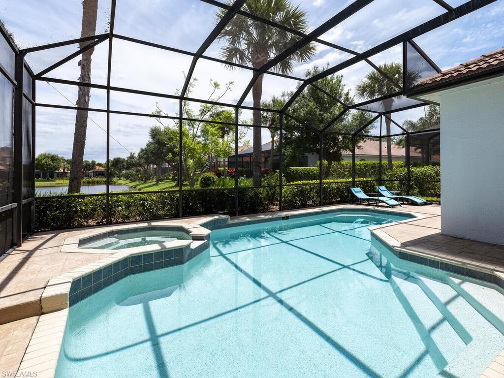 8846 Ventura Drive Naples, FL 34109 - Photo 16 of 18 a view of a terrace with a bench