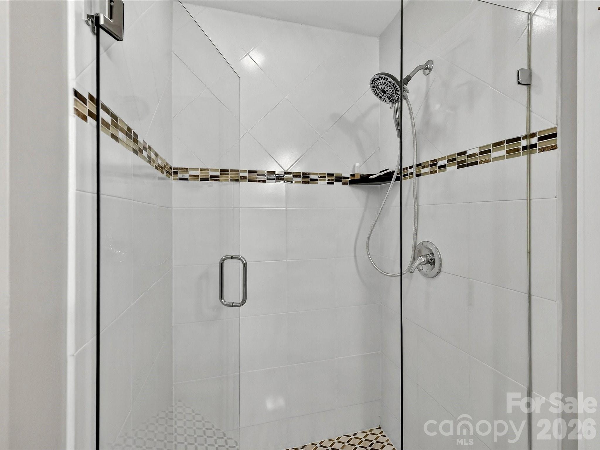 207 Hobbs Street Davidson, NC 28036 - Photo 21 of 40 a bathroom with a shower