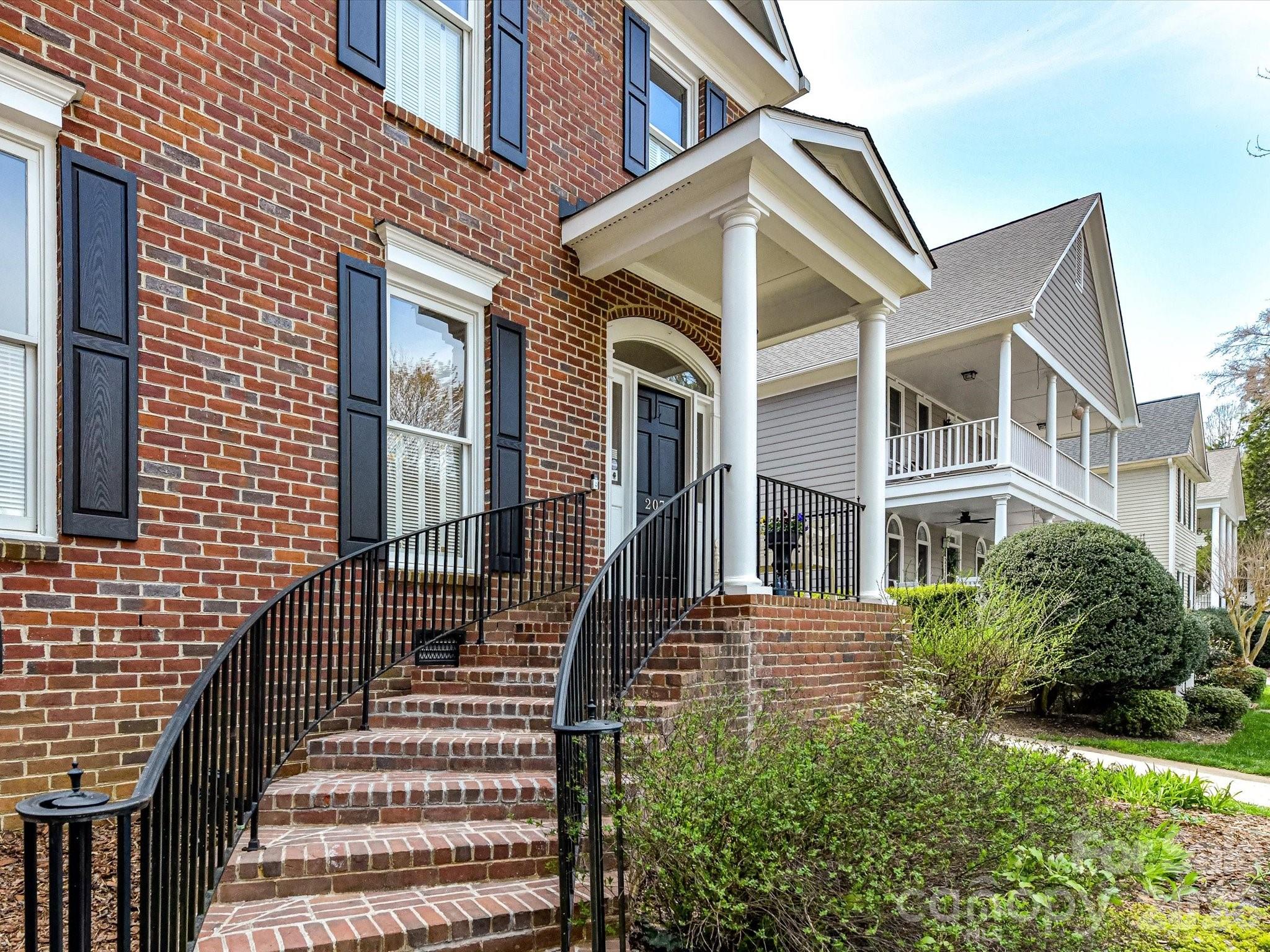 207 Hobbs Street Davidson, NC 28036 - Photo 3 of 40 a front view of a house