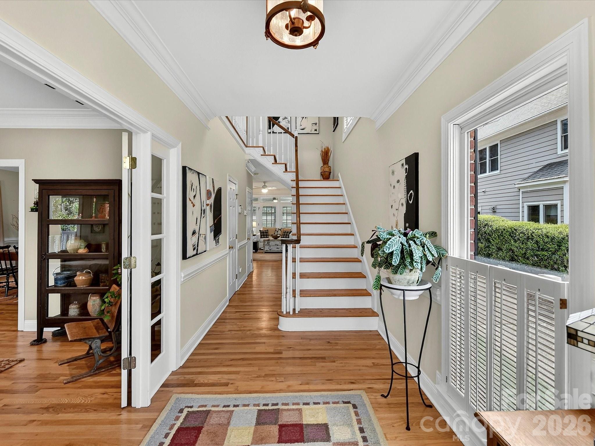 207 Hobbs Street Davidson, NC 28036 - Photo 4 of 40 a view of entryway and hall with wooden floor