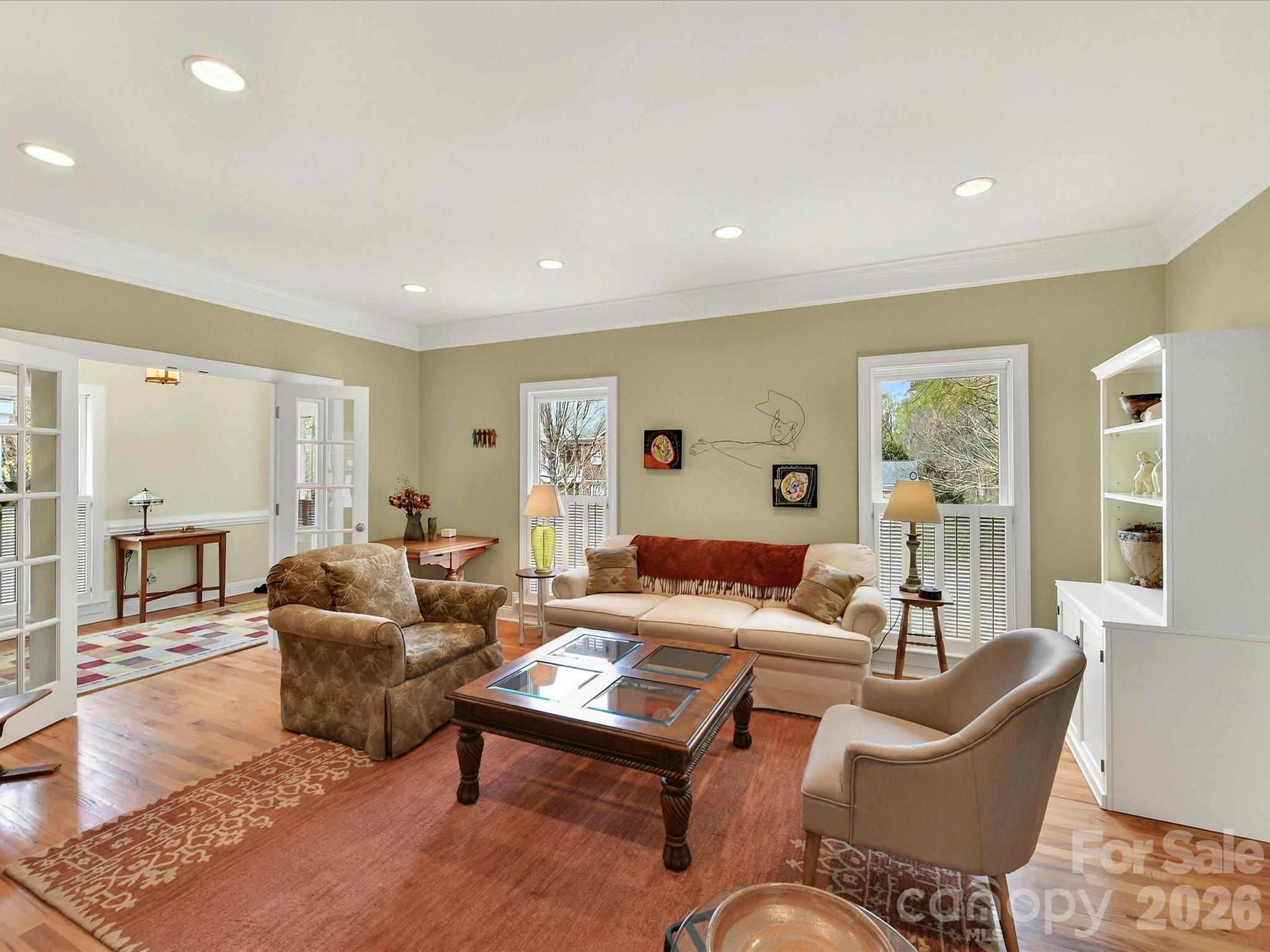 207 Hobbs Street Davidson, NC 28036 - Photo 6 of 40 a living room with furniture and wooden floor
