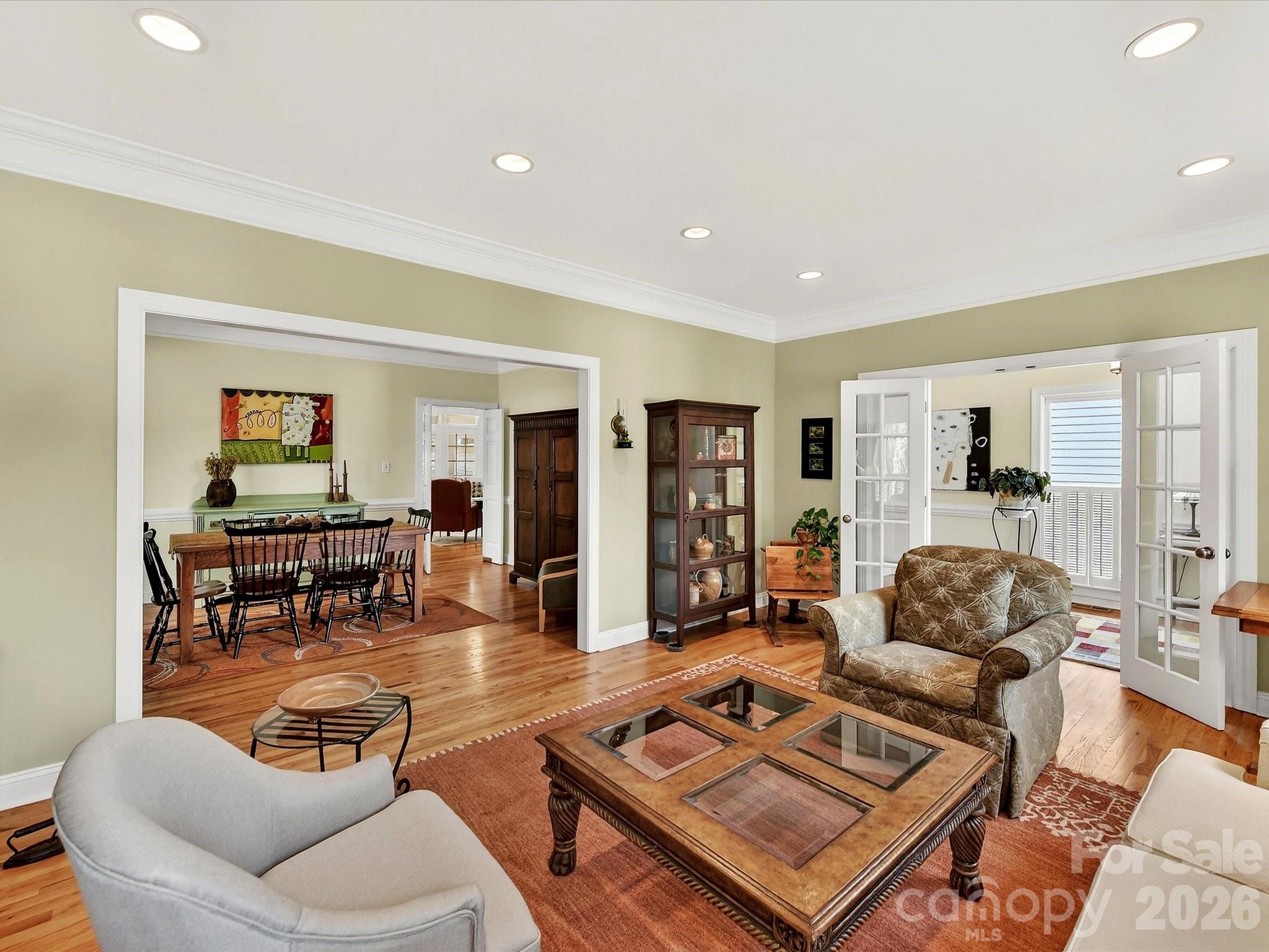207 Hobbs Street Davidson, NC 28036 - Photo 7 of 40 a living room with furniture and wooden floor