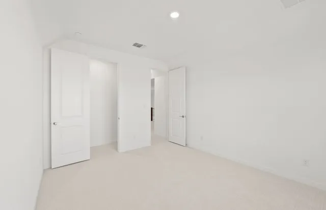 a view of a hallway with staircase