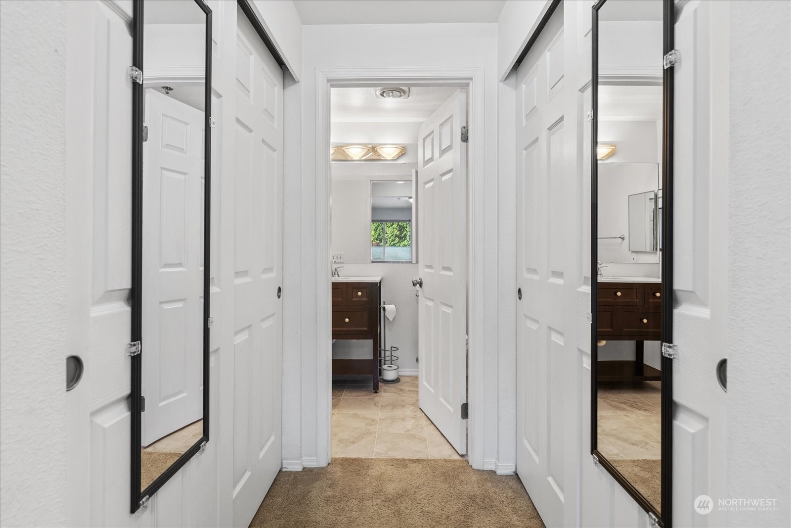 19316 Bothell Way Northeast, Unit C203 Bothell, WA 98011 - Photo 14 of 27 a view of a bathroom from a hallway