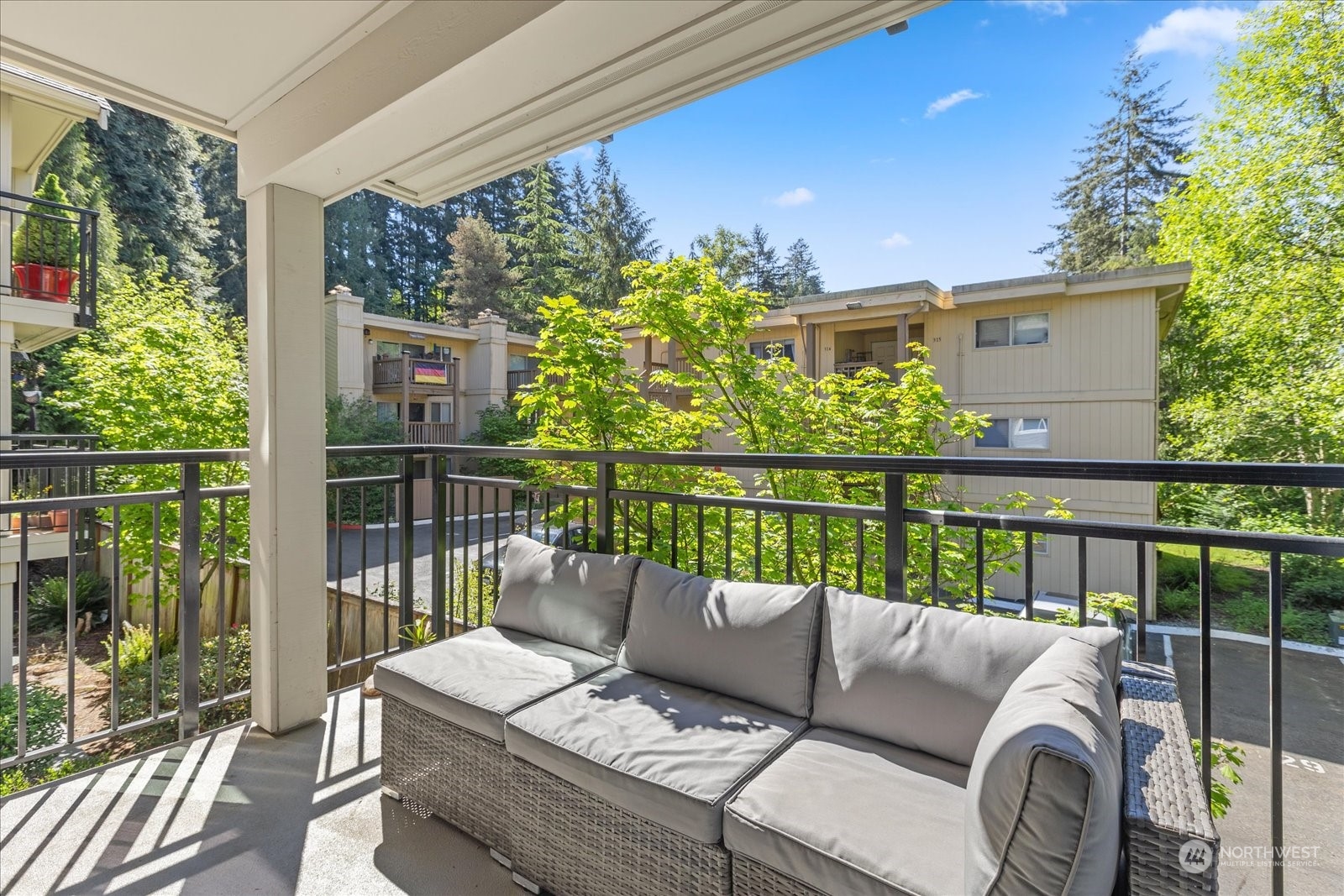 19316 Bothell Way Northeast, Unit C203 Bothell, WA 98011 - Photo 22 of 27 a balcony with furniture
