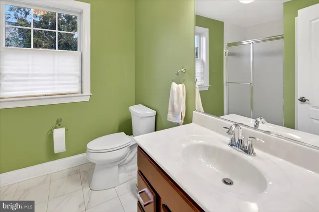 a bathroom with a sink and a toilet