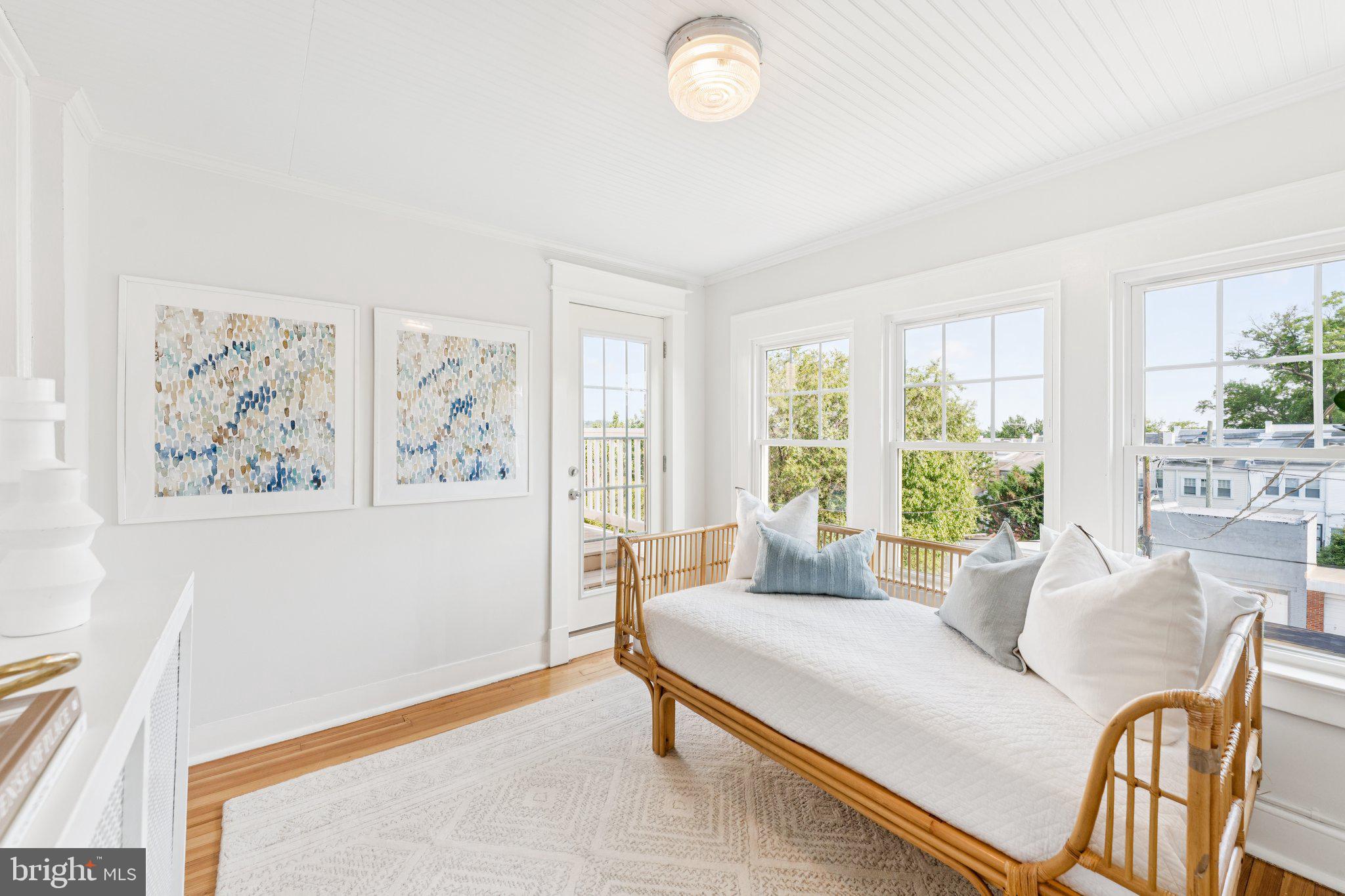 1412 Decatur Street Northwest Washington, DC 20011 - Photo 18 of 36 a living room with furniture and a large window