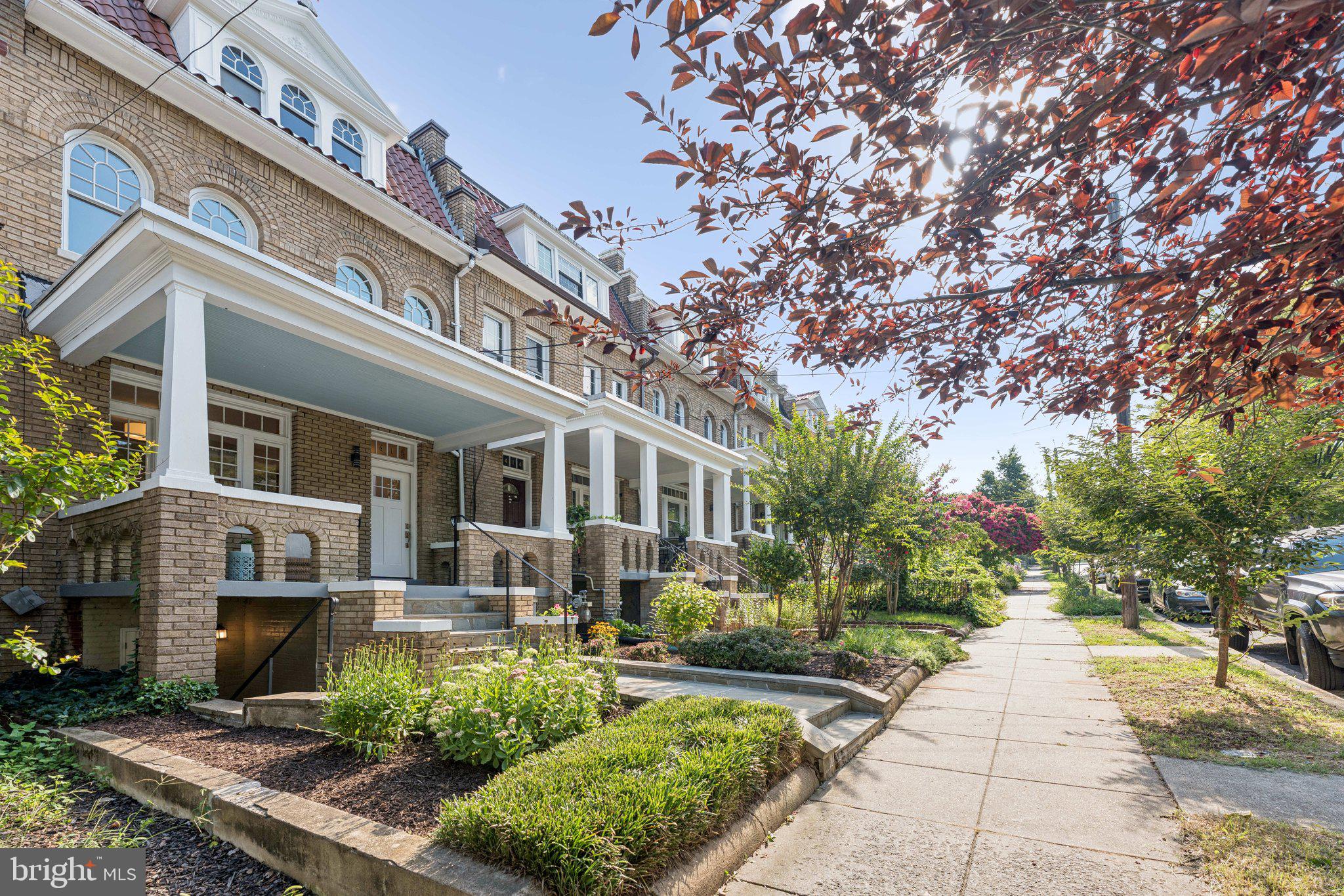 1412 Decatur Street Northwest Washington, DC 20011 - Photo 2 of 36 a front view of a house with garden