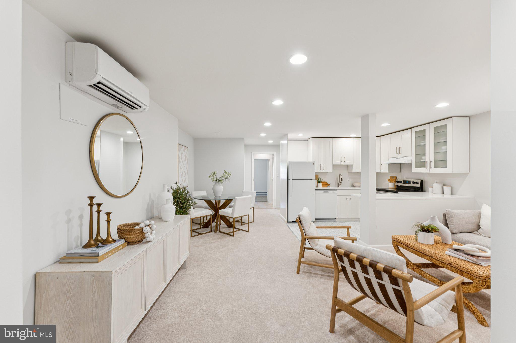 1412 Decatur Street Northwest Washington, DC 20011 - Photo 24 of 36 a living room with furniture a mirror and a table