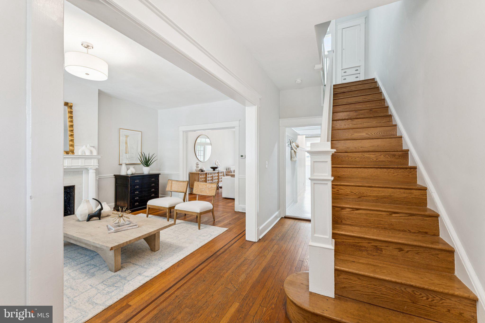 1412 Decatur Street Northwest Washington, DC 20011 - Photo 3 of 36 a living room with fireplace furniture and a wooden floor
