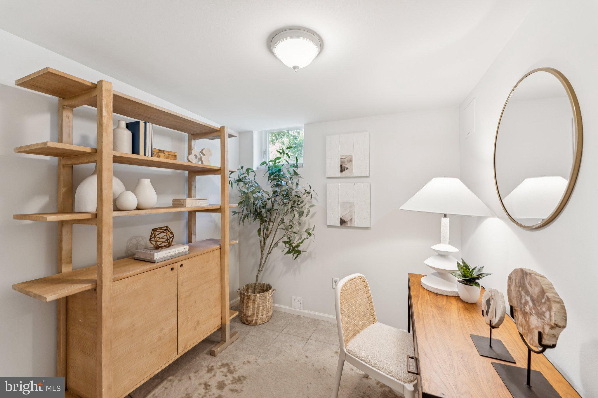1412 Decatur Street Northwest Washington, DC 20011 - Photo 31 of 36 a dining room with furniture and a potted plant