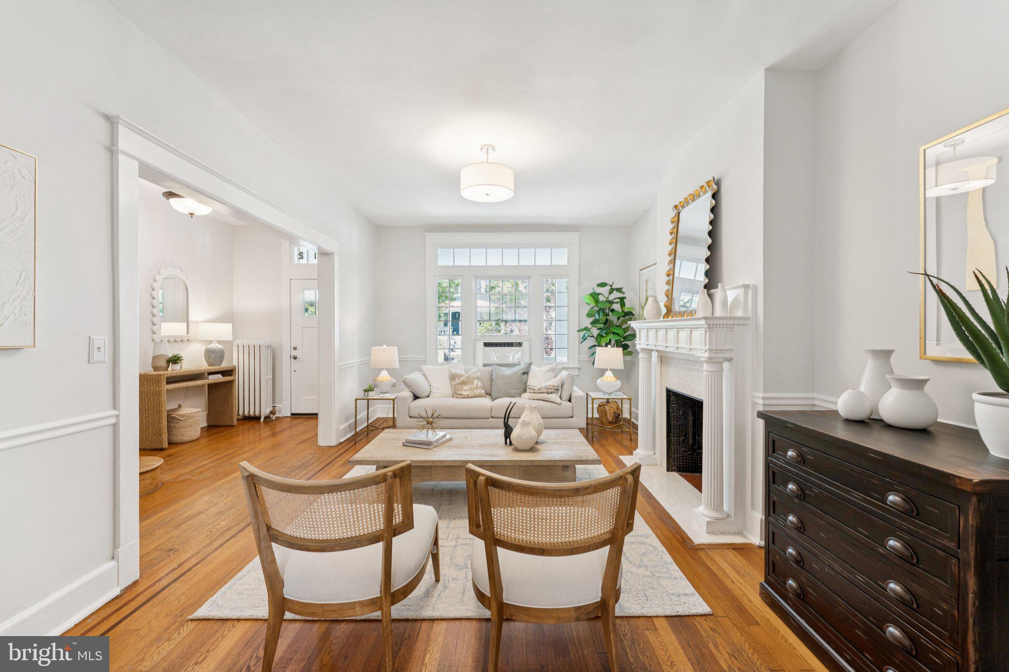 1412 Decatur Street Northwest Washington, DC 20011 - Photo 6 of 36 a dining room with furniture and fireplace