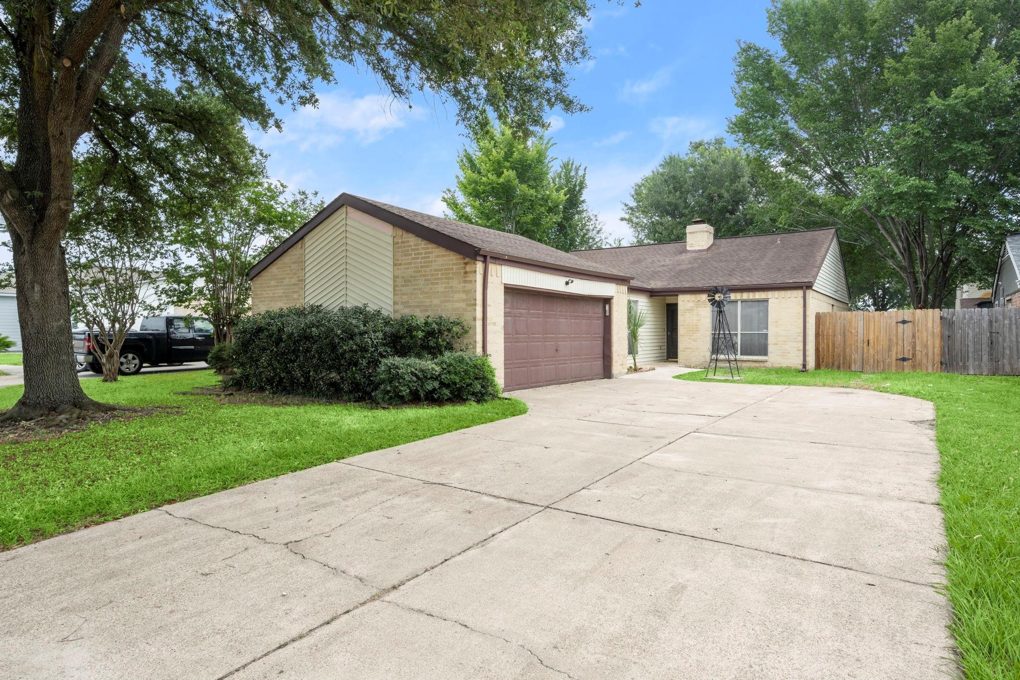 11718 Ridge Run Drive Houston, TX 77064 - Photo 1 of 17 a front view of house with yard and green space