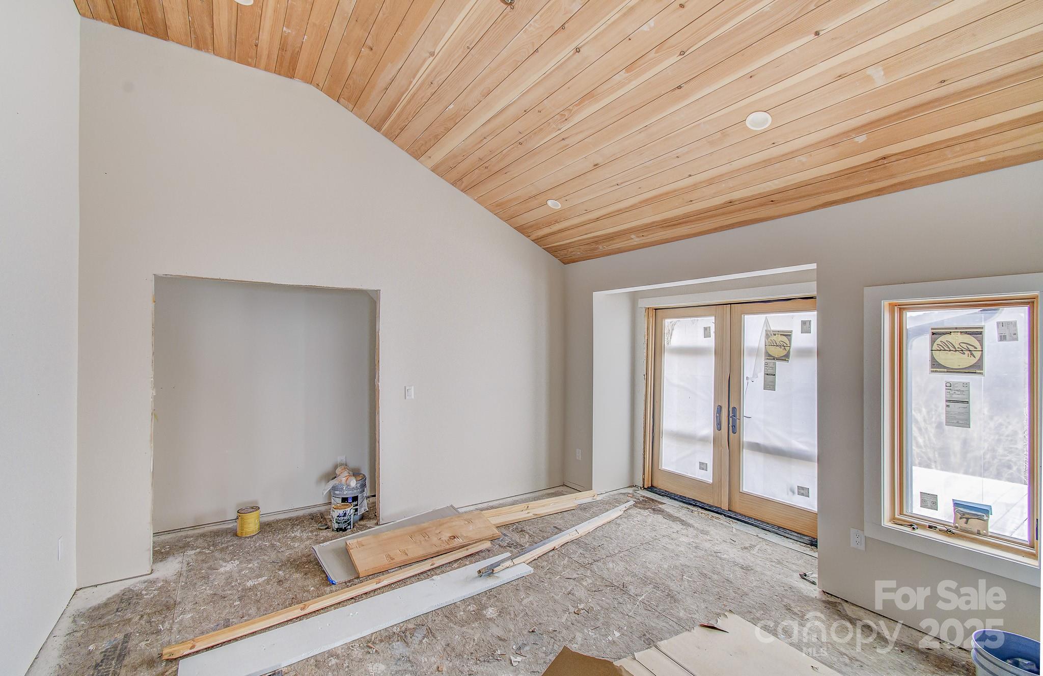 475 Dancing Bear Drive Hendersonville, NC 28792 - Photo 18 of 29 a bathroom with a granite countertop sink and large mirror