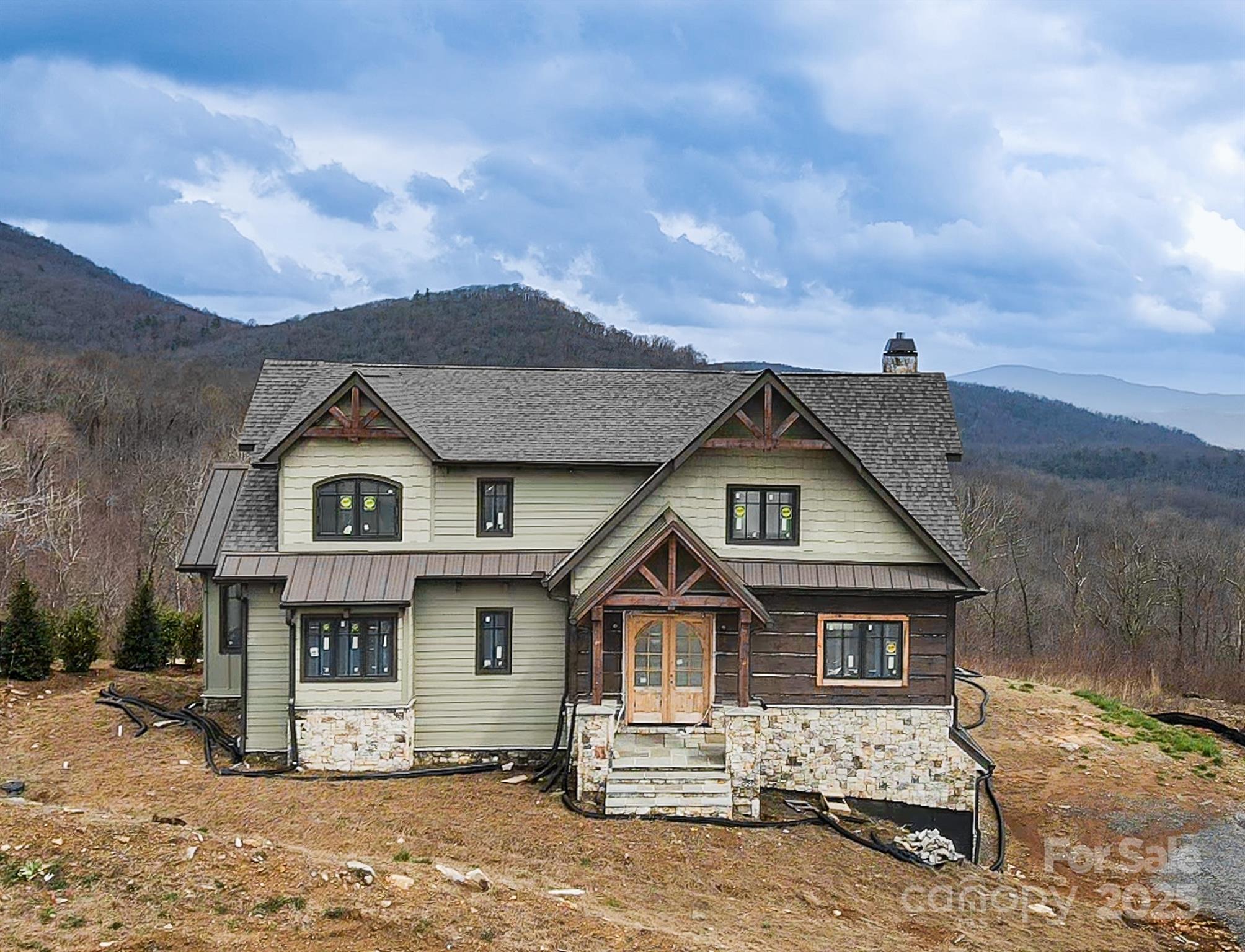 475 Dancing Bear Drive Hendersonville, NC 28792 - Photo 2 of 29 a front view of a house with a yard