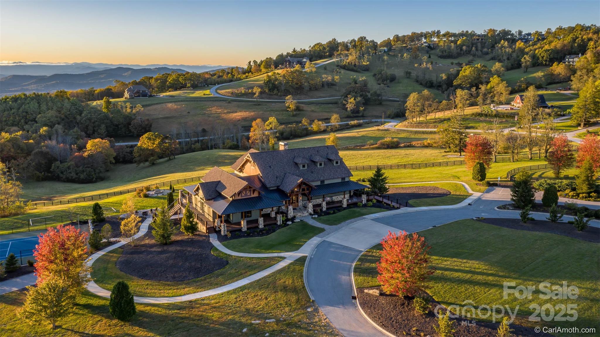 475 Dancing Bear Drive Hendersonville, NC 28792 - Photo 22 of 29 an aerial view of a house with outdoor space and a lake view