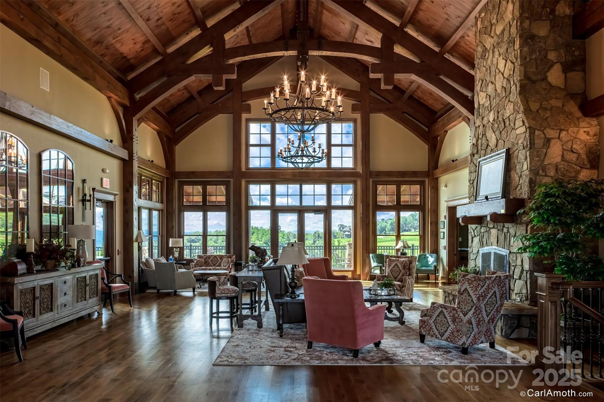 475 Dancing Bear Drive Hendersonville, NC 28792 - Photo 23 of 29 a living room with fireplace furniture and a large window