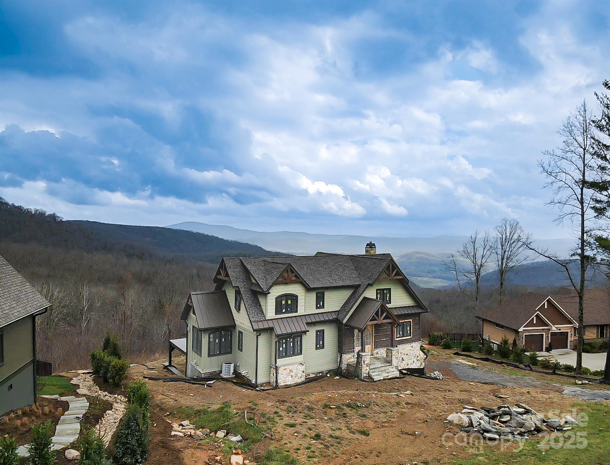 475 Dancing Bear Drive Hendersonville, NC 28792 - Photo 28 of 29 a view of a house with a yard in front of it