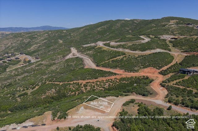 1705 East Wrangler Loop Kamas, UT 84036 - Photo 3 of 16 View of property location with property boundaries highlighted and a mountain backdrop