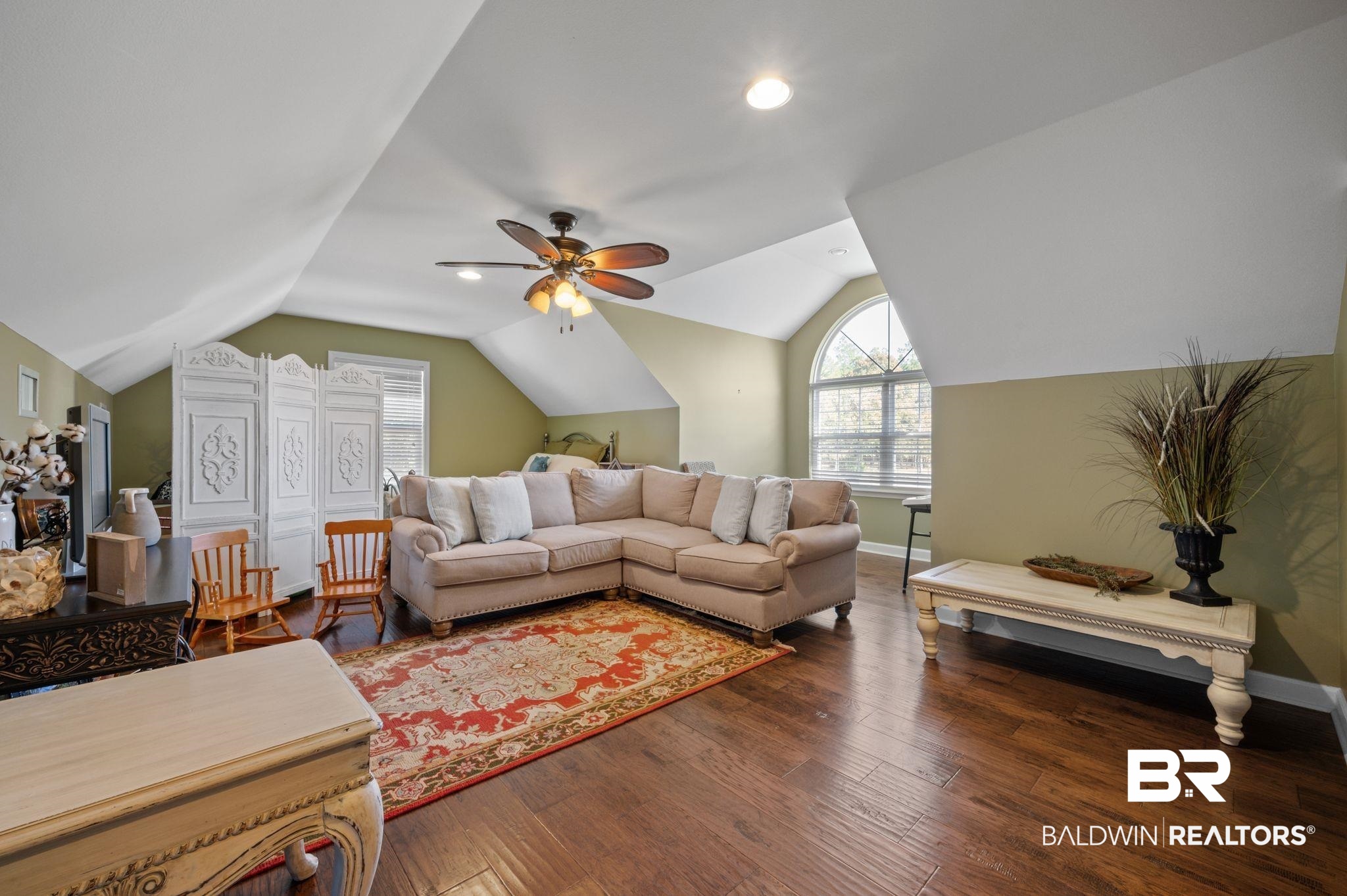 38211-d) V R Byrd Road Bay Minette, AL 36507 - Photo 25 of 58 Living room featuring ceiling fan, dark hardwood / wood-style flooring, and vaulted ceiling