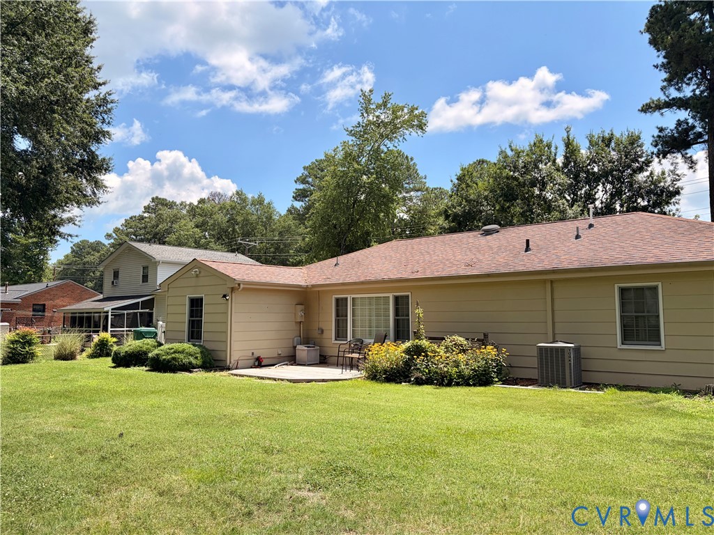 4810 Conduit Road Colonial Heights, VA 23834 - Photo 5 of 9 Expansive rear lawn featuring a concrete patio