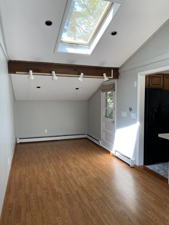28 Savoy Road Framingham, MA 01701 - Photo 18 of 42 an empty room with wooden floor and windows