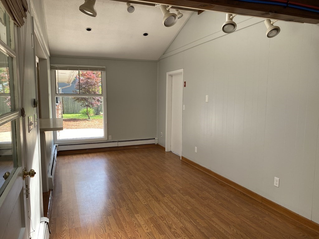 28 Savoy Road Framingham, MA 01701 - Photo 19 of 42 a view of hallway with wooden floor